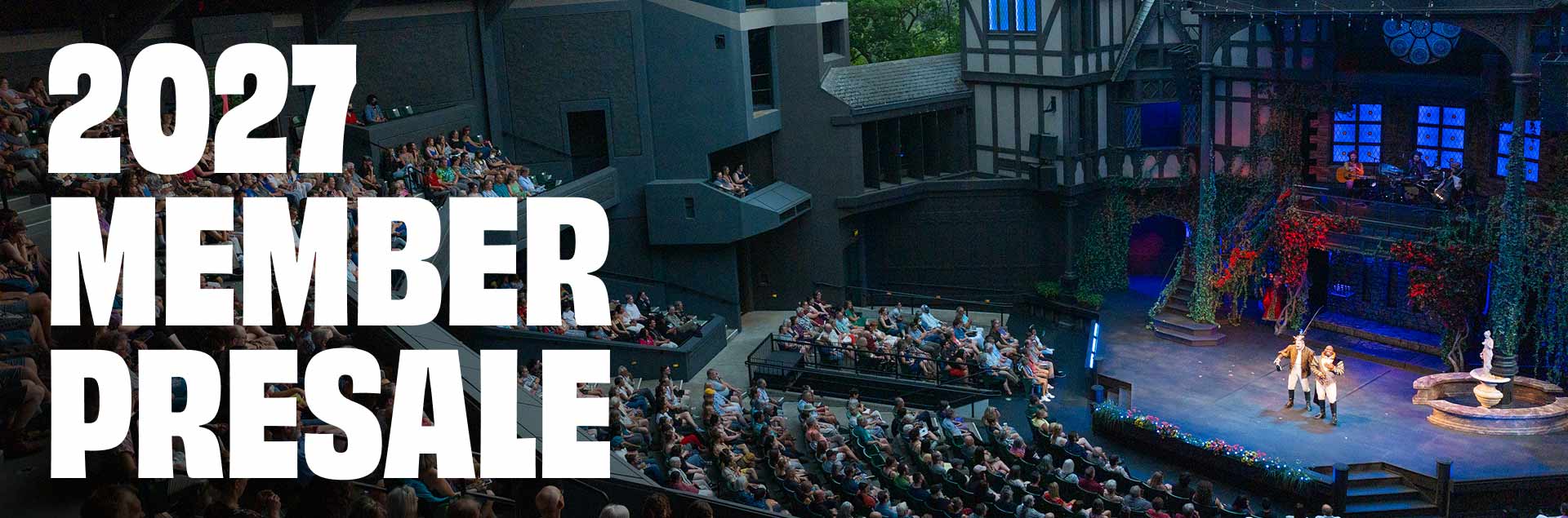 Large audience seated in a theater watching a live stage performance, with overlaid text reading '2027 Member Presale'.