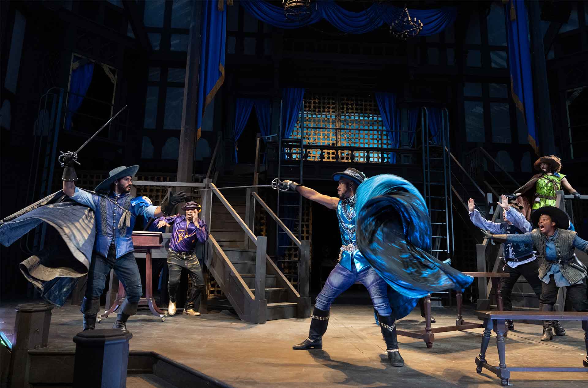 People sword fighting.