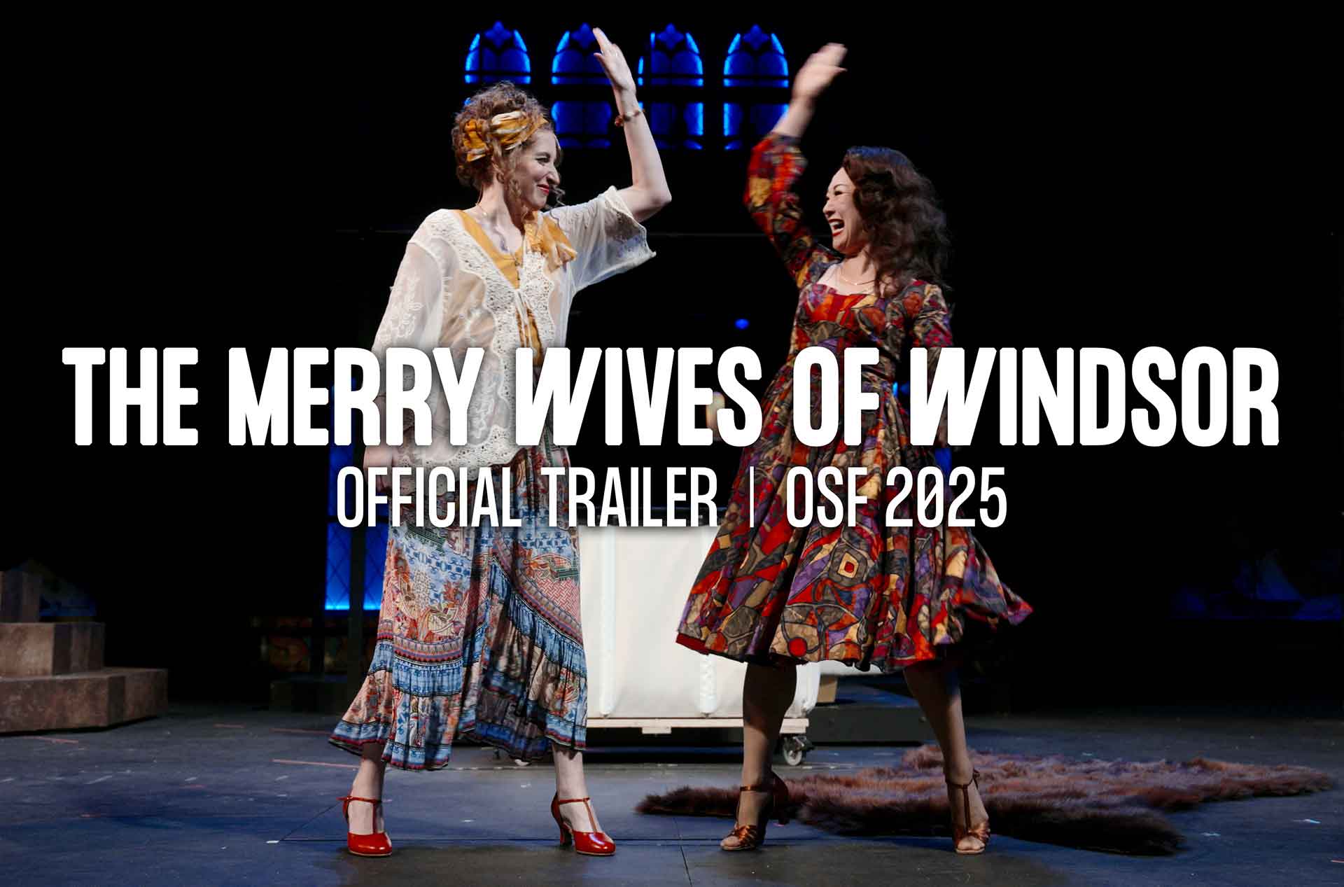Two performers in colorful, patterned costumes high-five on stage during a theatrical production. Bold white text reads: “The Merry Wives of Windsor – Official Trailer | OSF 2025.”