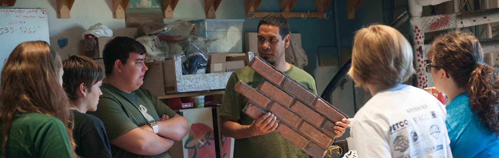 Gabriel Berrara, Charge Scenic Artist and Summer Seminar students