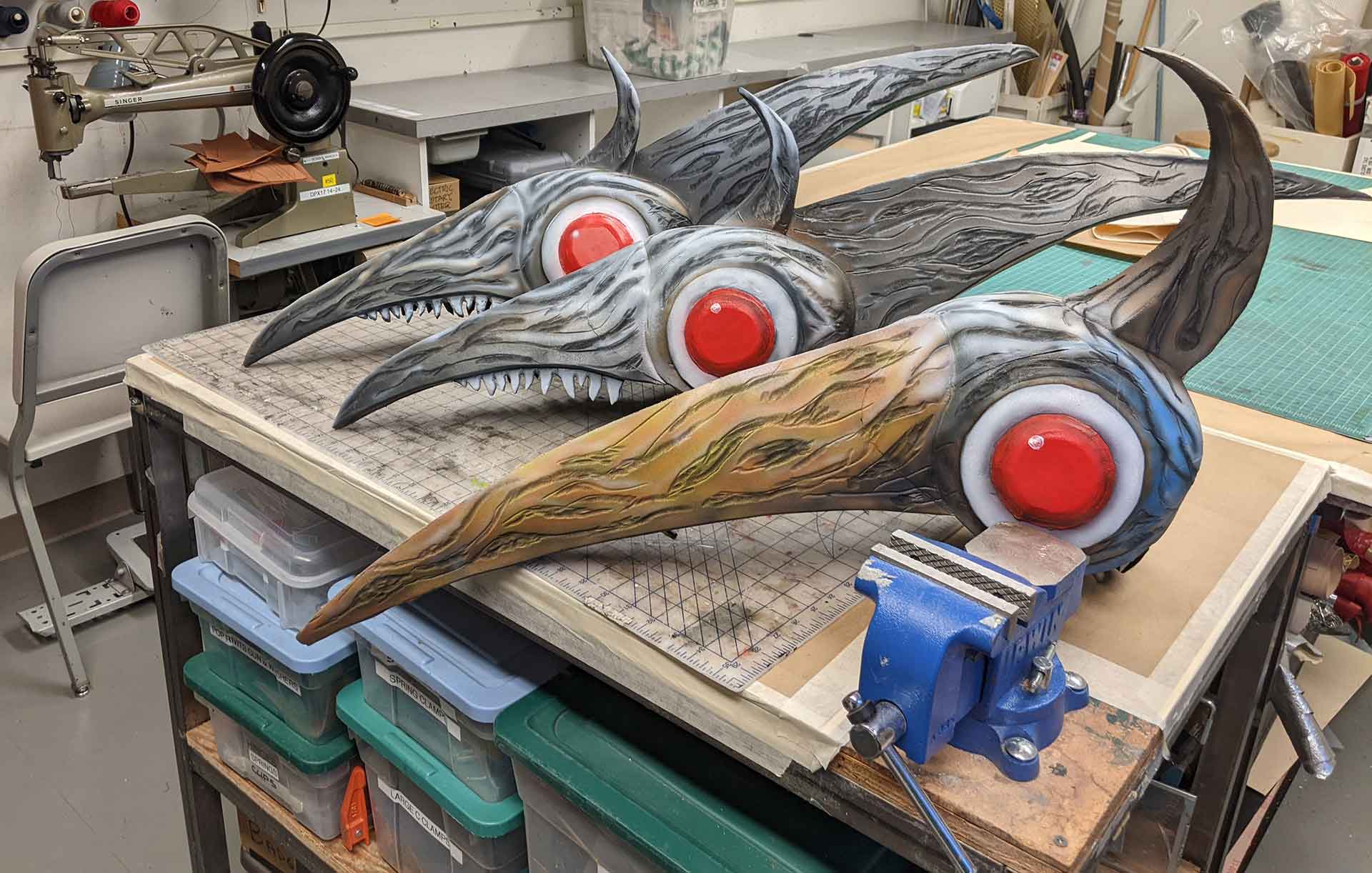 Bird head shapes for <i>The Tempest</i> under construction in the Costume Shop